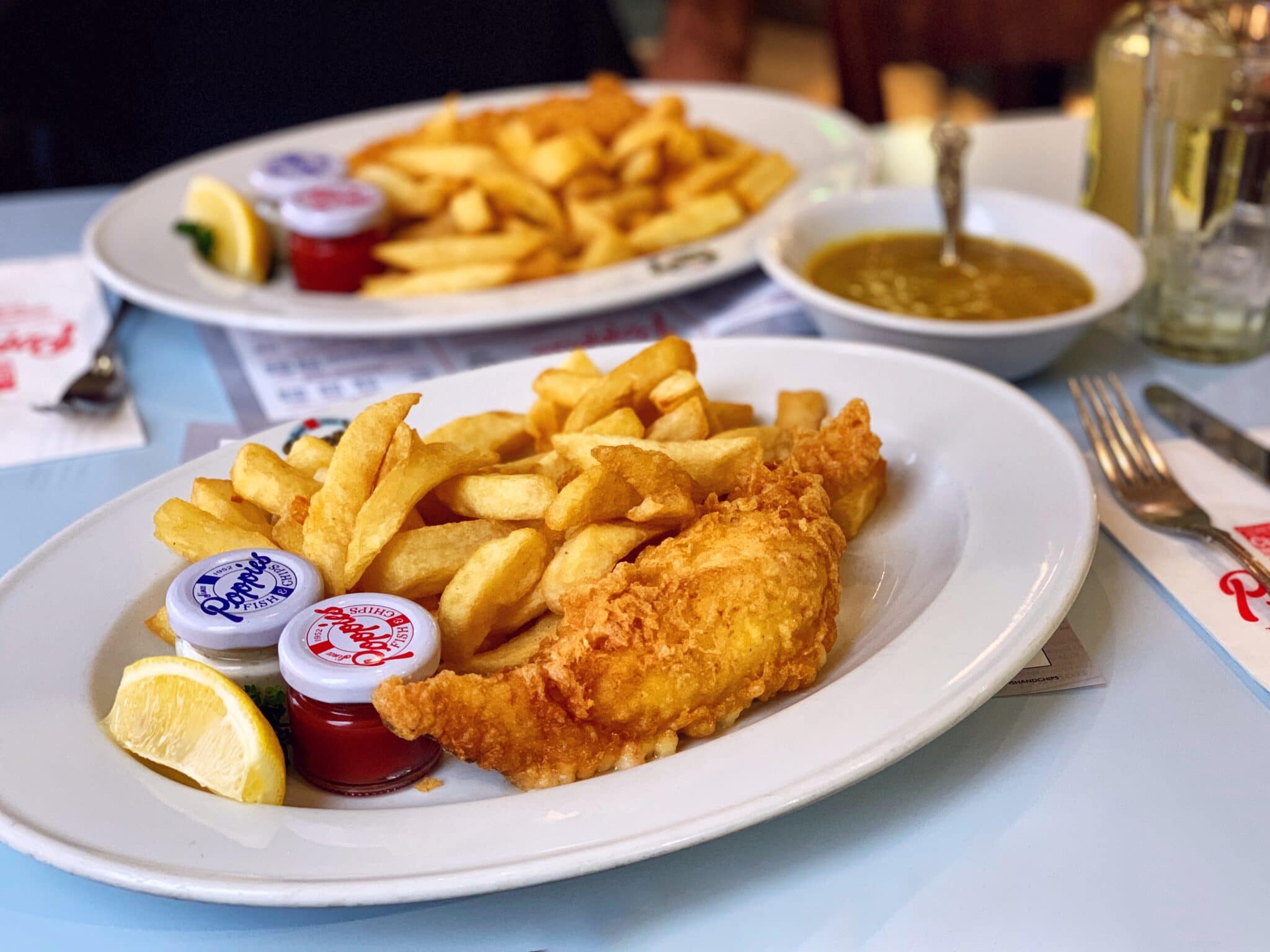 Image of a plate of Fish & Chips at Poppies Fish & Chips